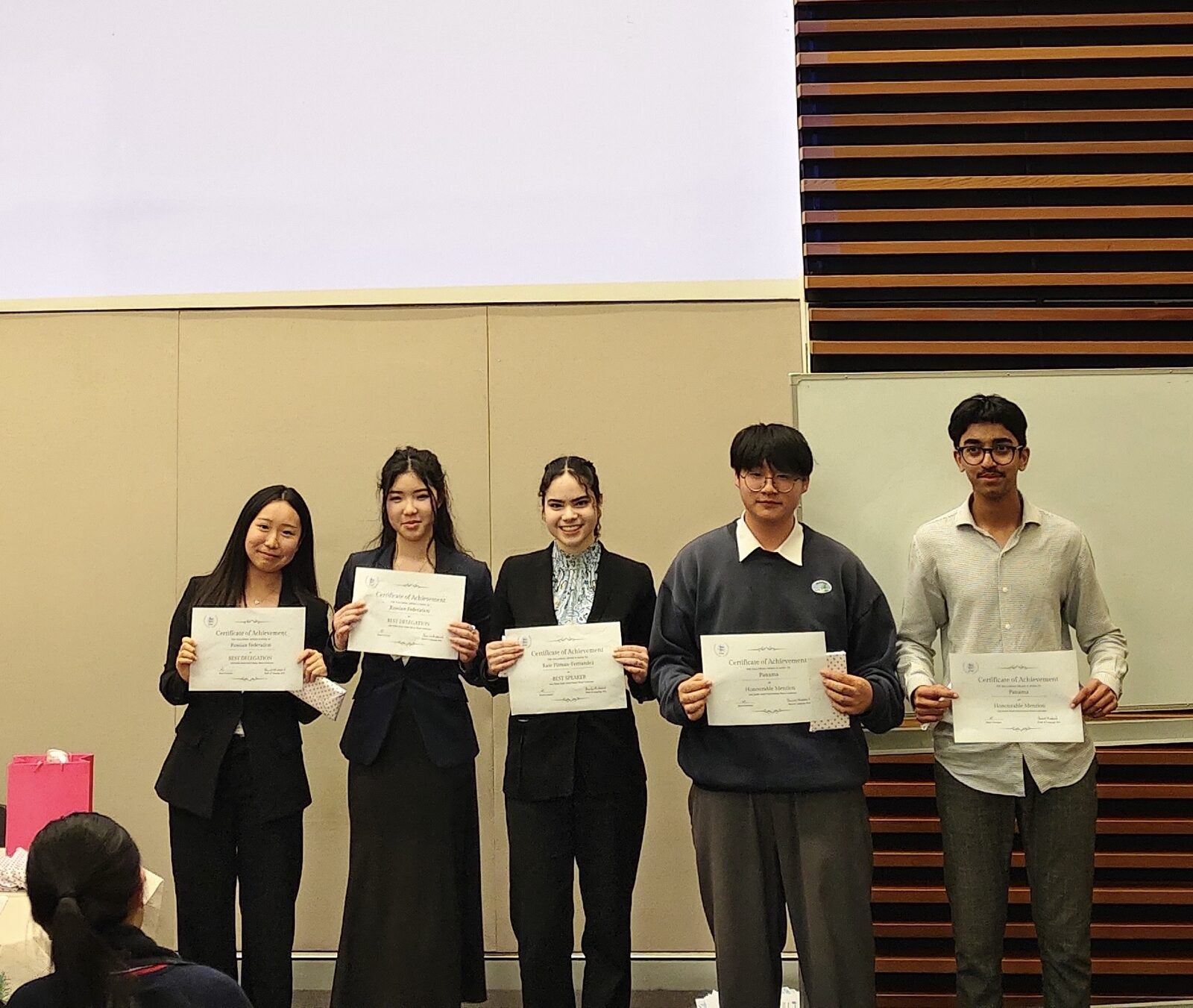 Group of delegates with certificates