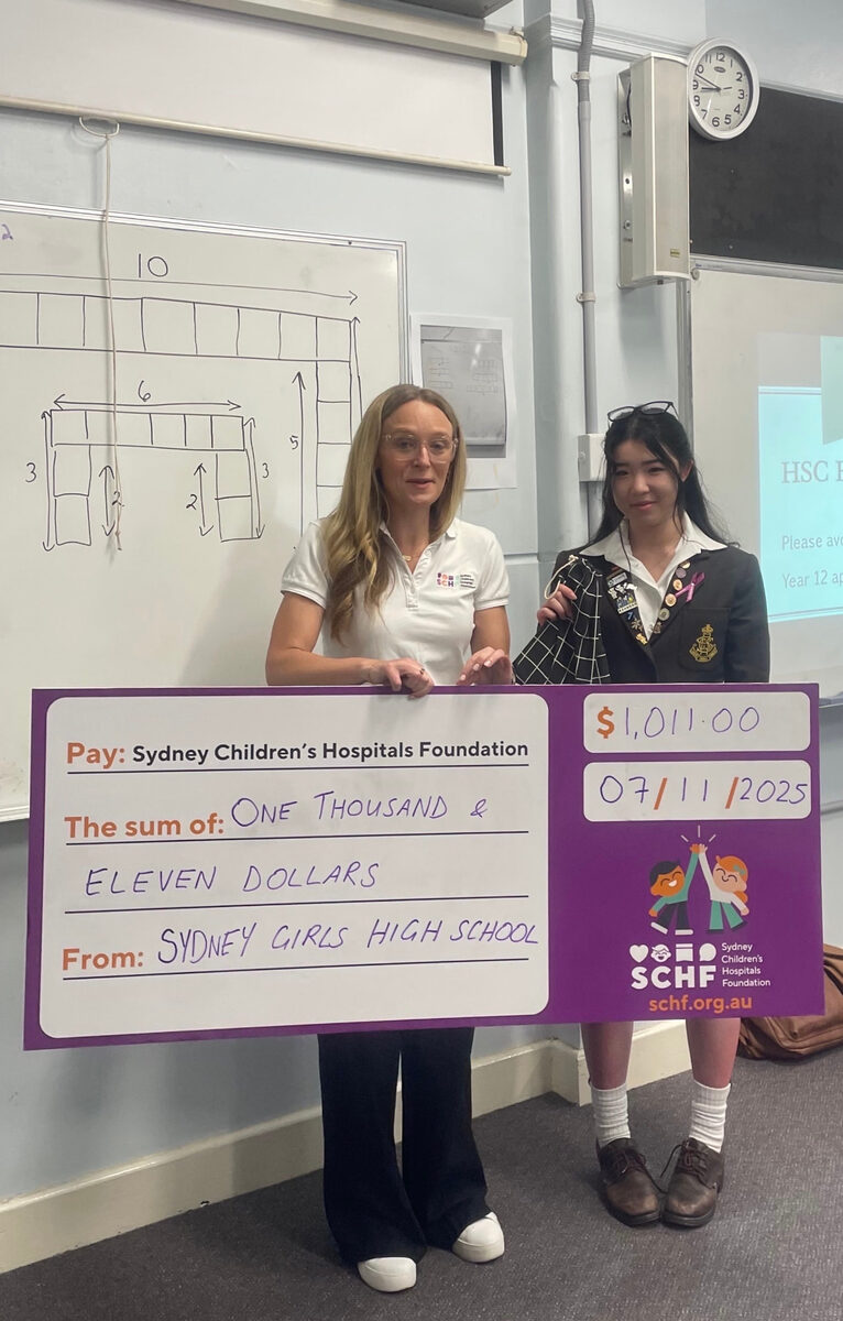 Presenting a donation cheque to SCHF